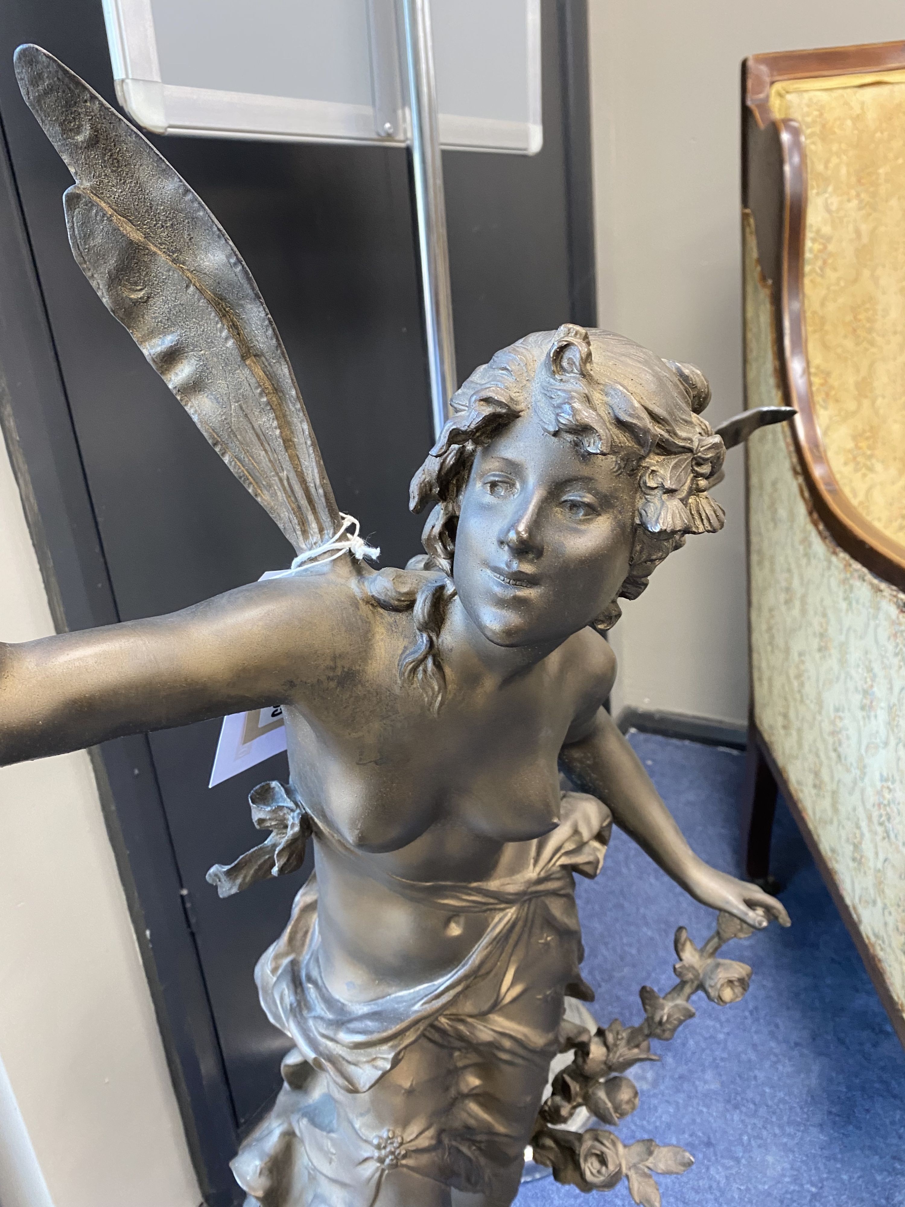 A 'Fee Aux Fleurs' cast bronze spelter fairy statue on marble base, height 90cm